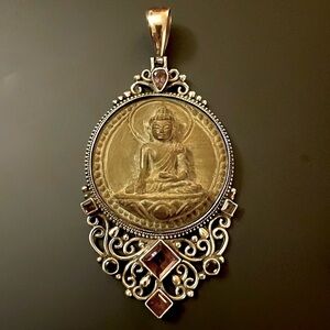 Stone Buddha pendant in Sterling filigree setting with amethyst stones